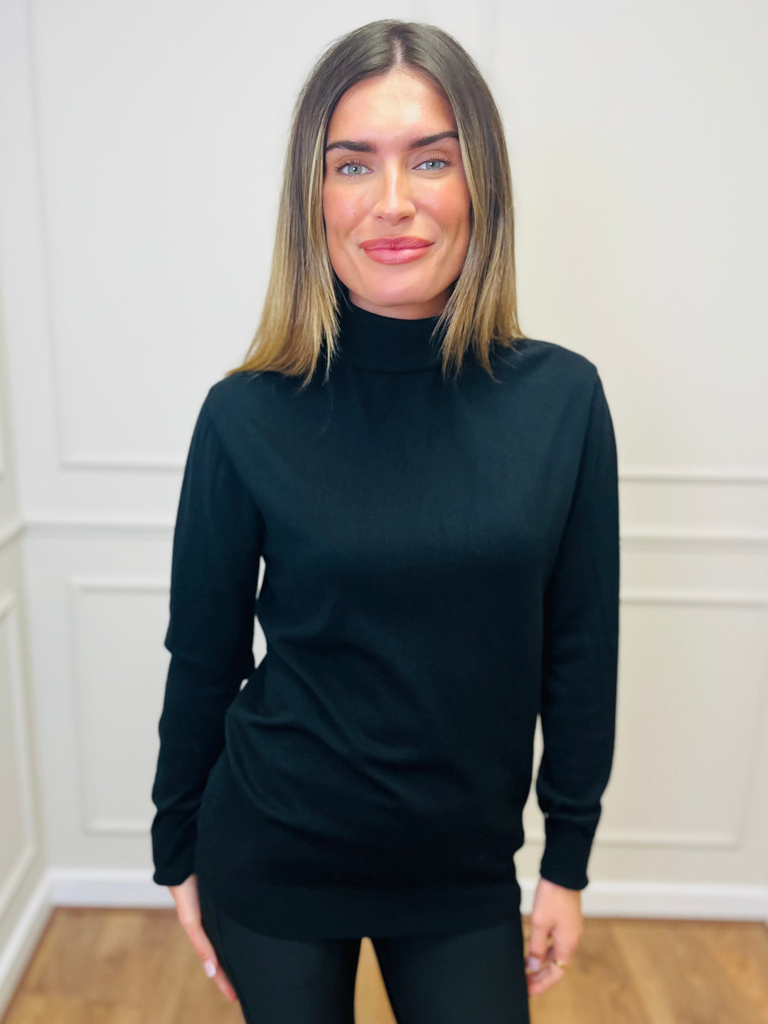 "ROBIN" Polo Neck-Black