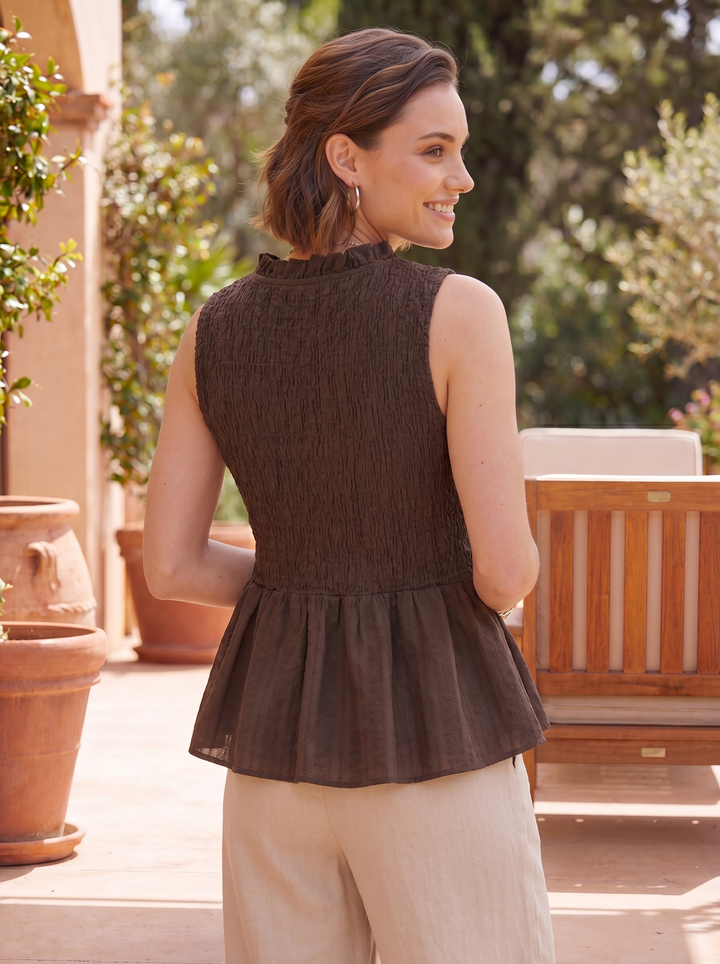 “FRANCES” Sleeveless Shirred Peplum Top