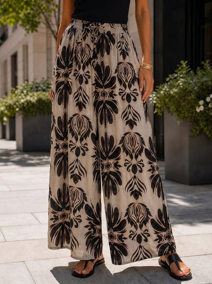 “KIA” Bontanical Print Wide Leg Trousers black