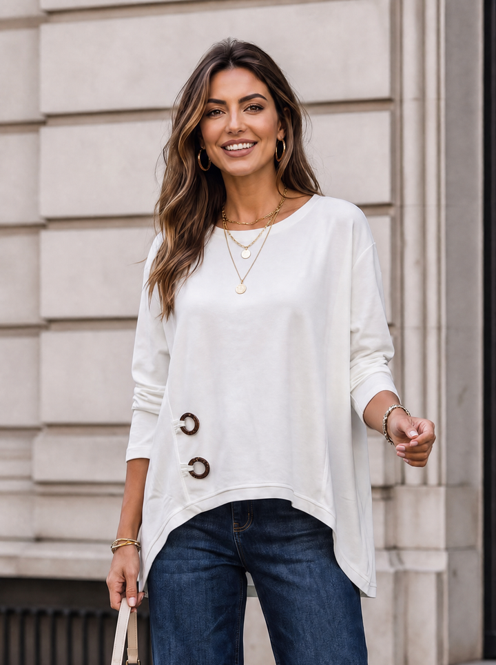 “KENZIE Collection” Eyelet Detail Dipped Hem Sweat Top cream