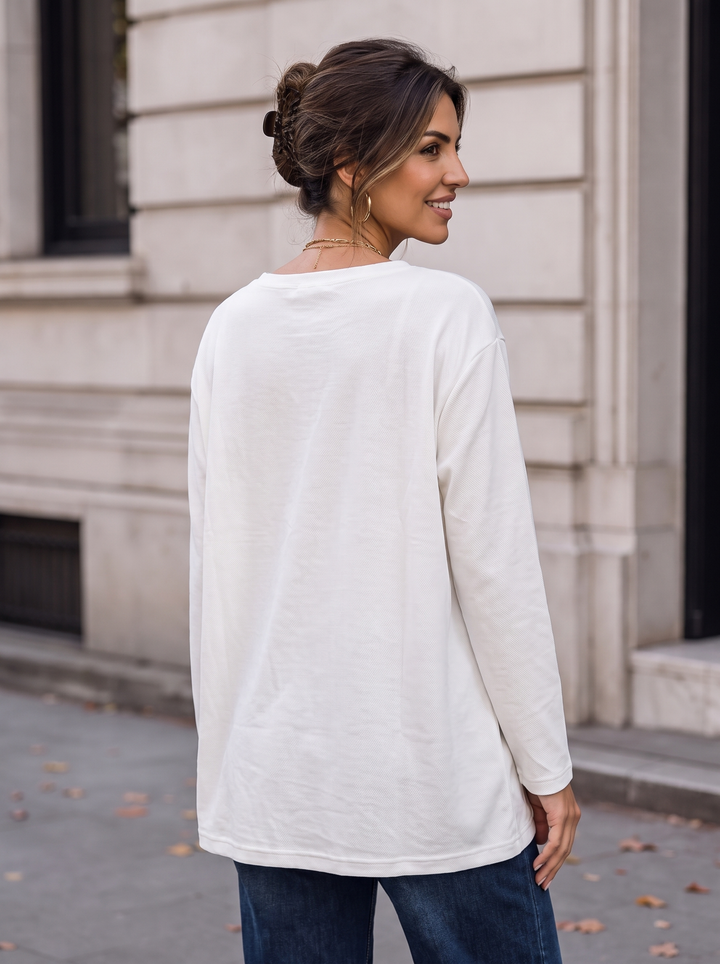 “KENZIE Collection” Eyelet Detail Dipped Hem Sweat Top cream