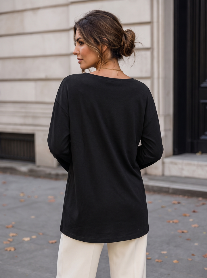 “KENZIE Collection” Eyelet Detail Dipped Hem Sweat Top black